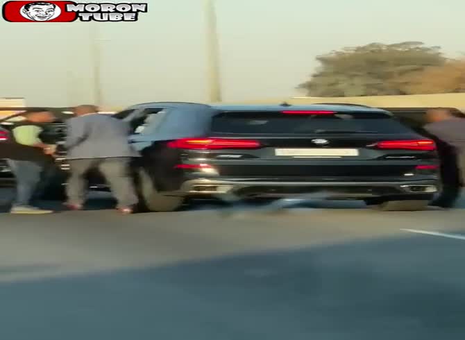 Video :A guy is trampled to unconsciousness by the squad of South Africa's Deputy President